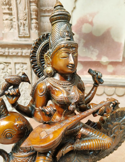 Sarasvati Sculpture Sitting On Peacock Copper Bronze finished craftsview