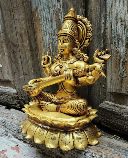 Brass Sarasvati Idol sitting on lotus 11" craftsview