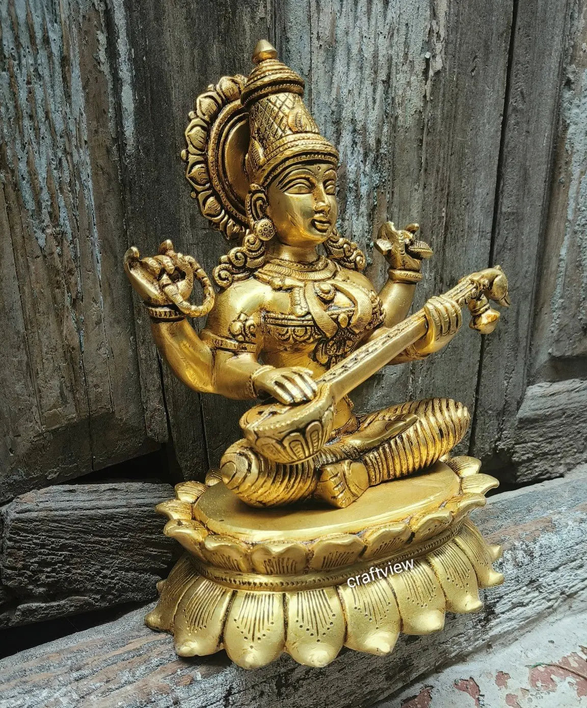 Brass Sarasvati Idol sitting on lotus 11" craftsview