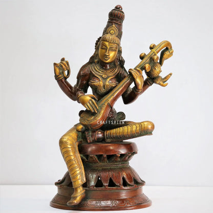 Brass Sarasvati Statue sitting on lotus Gold Copper Green craftsview