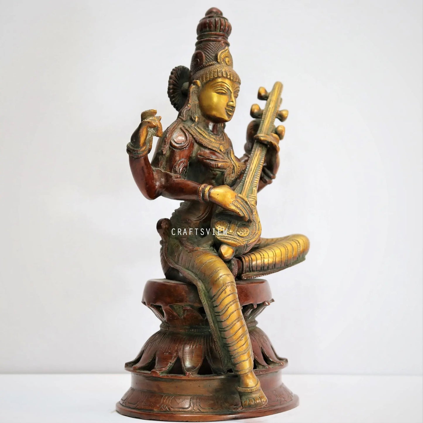 Brass Sarasvati Statue sitting on lotus Gold Copper Green craftsview