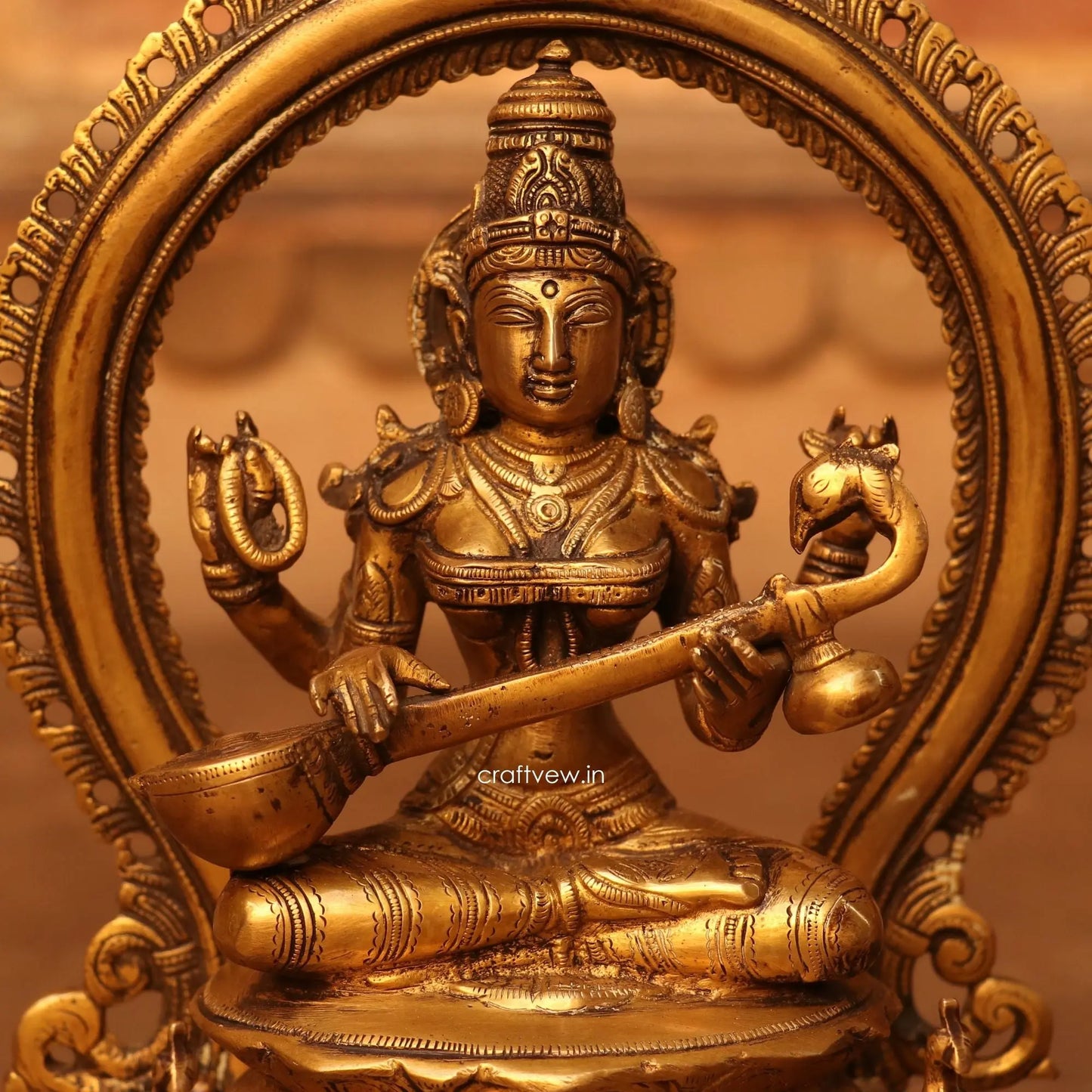 Brass Sarasvati Idol sitting on lotus Base craftsview