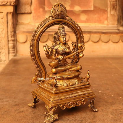 Brass Sarasvati Idol sitting on lotus Base craftsview