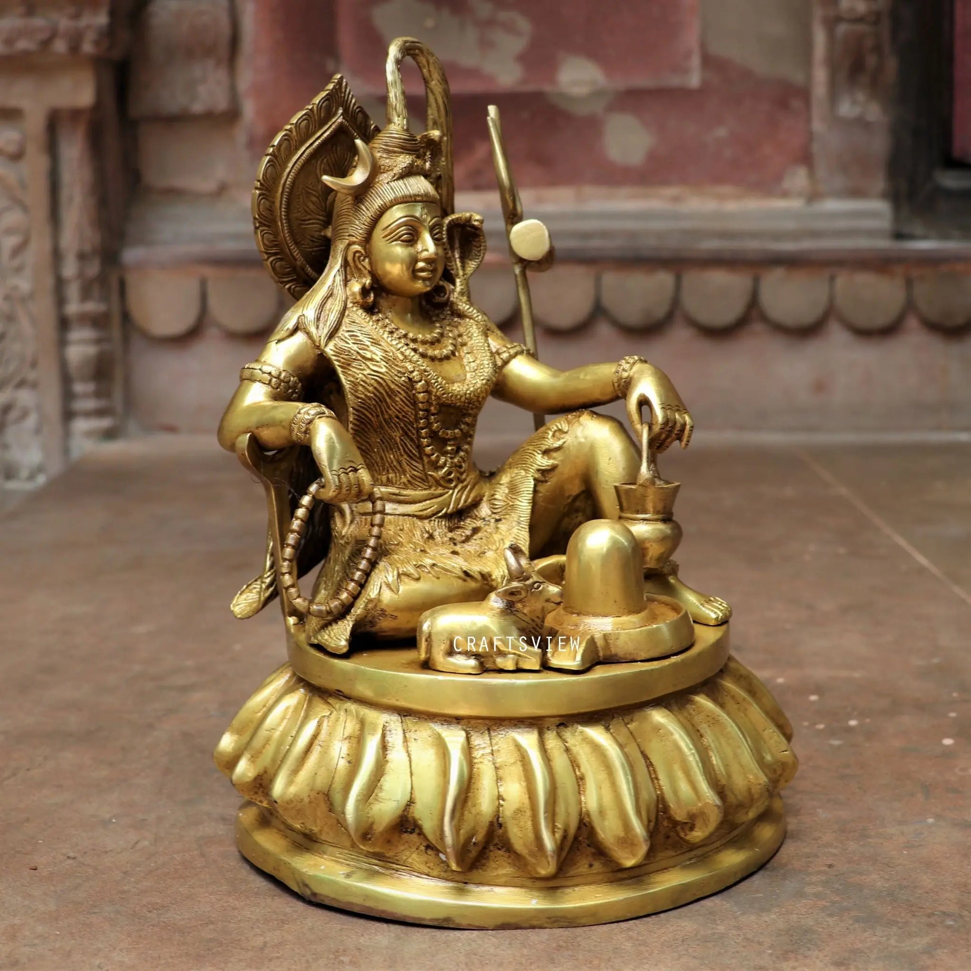 Brass Shiva Statue Sitting On Floral Base craftsview