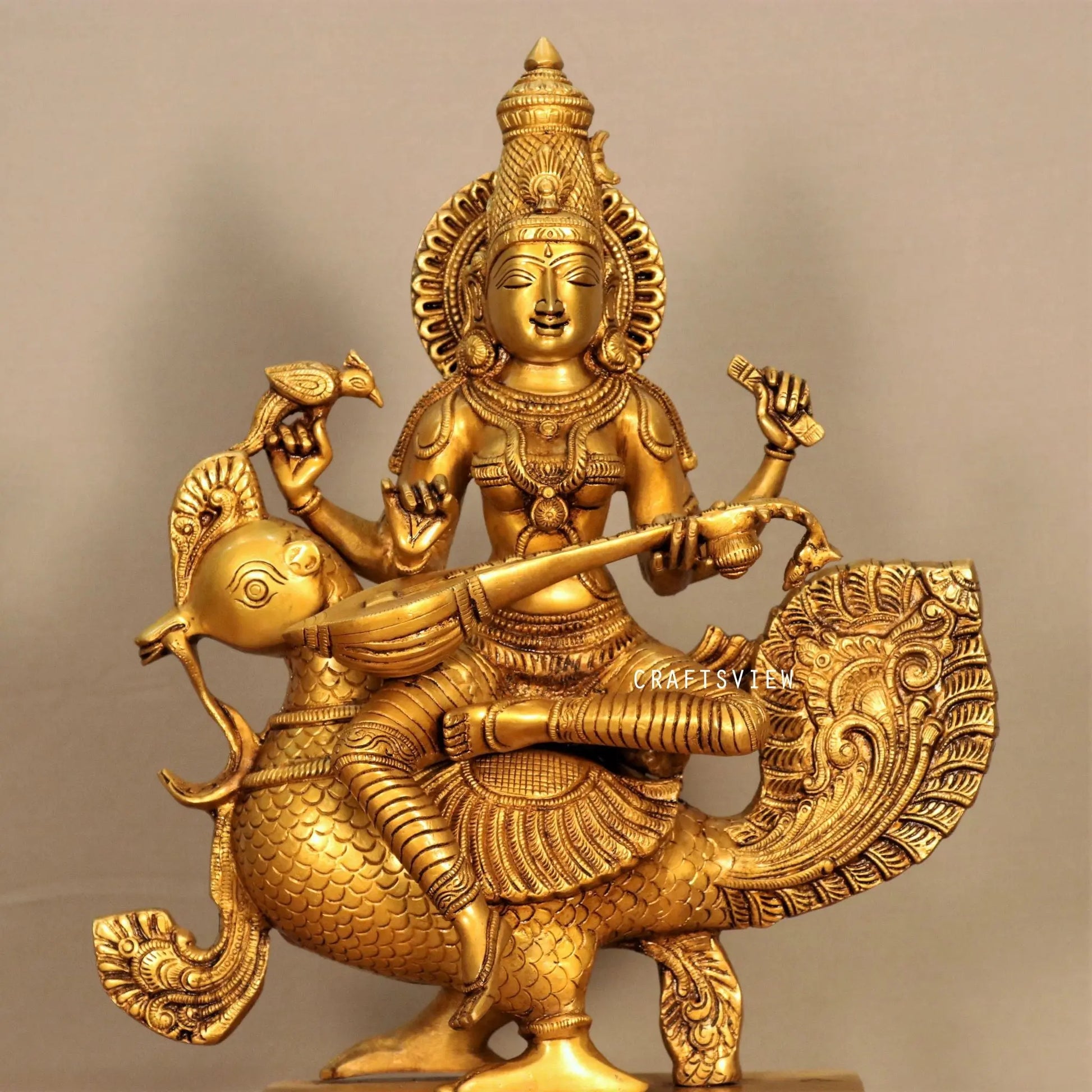 Brass Sarasvati Chola Sculpture Sitting On Peacock craftsview