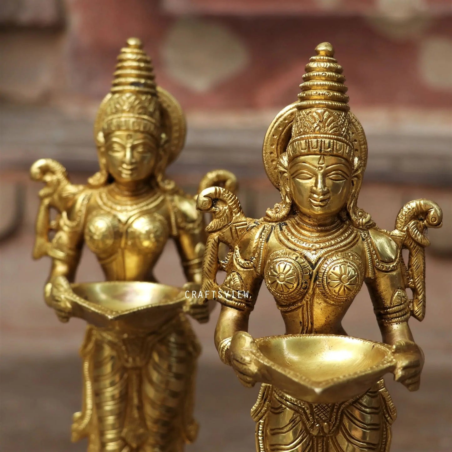 explore the hand picked collection of brass statues and décor